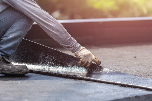 Professional Basement Waterproofing technician working in Lansdowne, MD